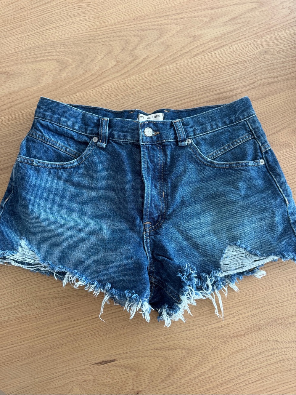 We The Free Dark Blue Distressed Denim Cutoff Shorts